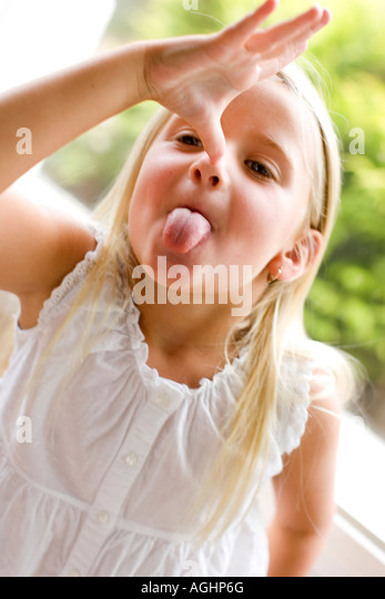 girl sticking her tongue out Stock Photo, Royalty Free Image: 14216679 ...