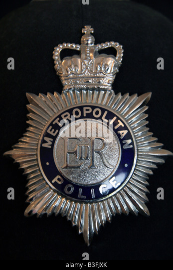 Helmet badge of the London Metropolitan Police Stock Photo, Royalty ...