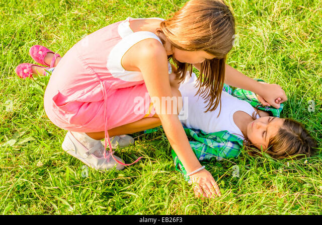 Two little girls fighting Stock Photo, Royalty Free Image: 75651719 - Alamy